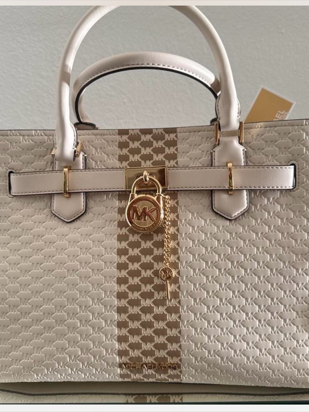 Michael Kors Cream & Tan MK Signature Satchel with Gold Hardware
New